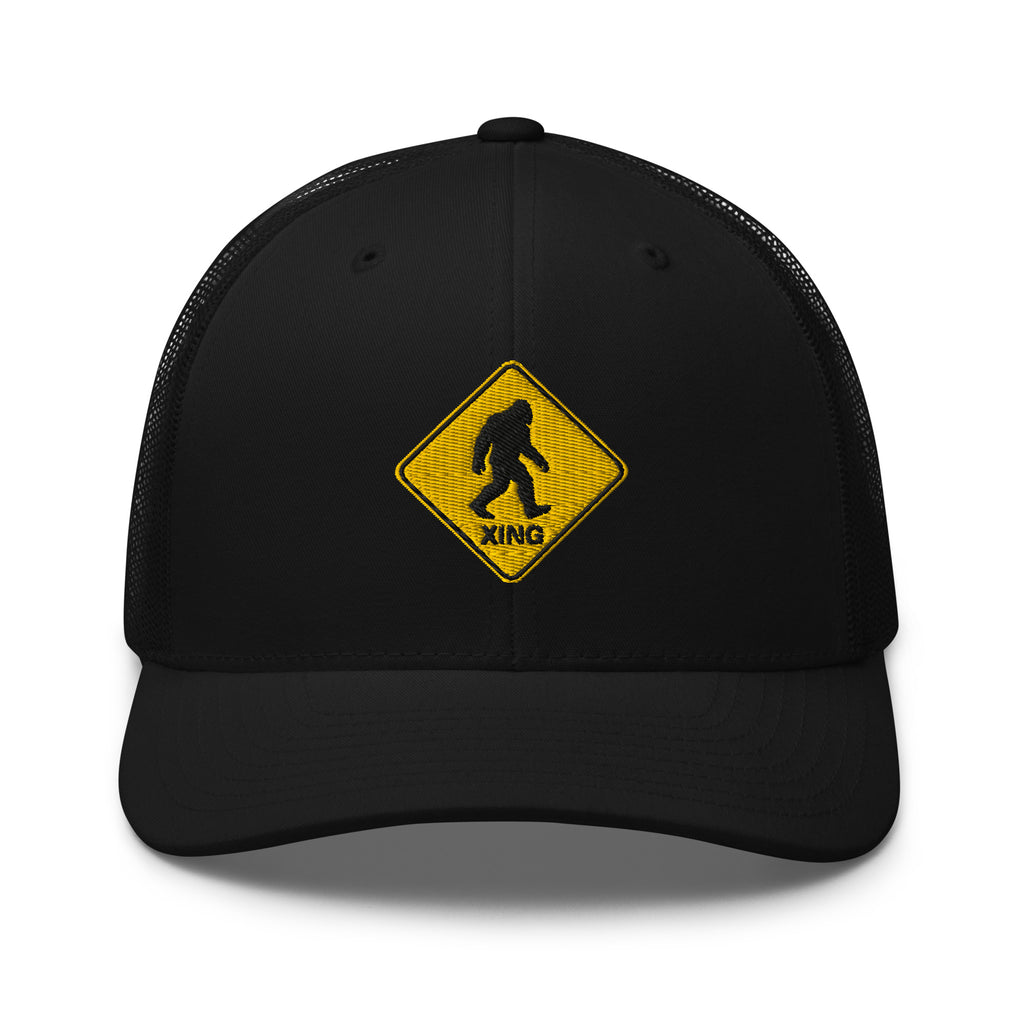 Bigfoot crossing sign embroidered black trucker hat front view – funny outdoor hiking cap