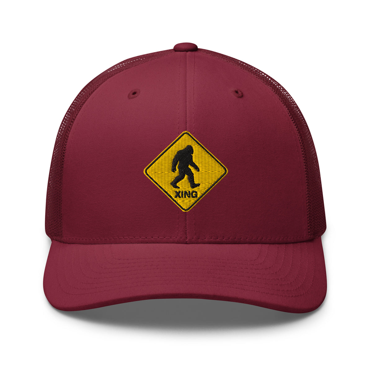 Bigfoot crossing sign embroidered cranberry trucker hat front view – funny outdoor gift hat