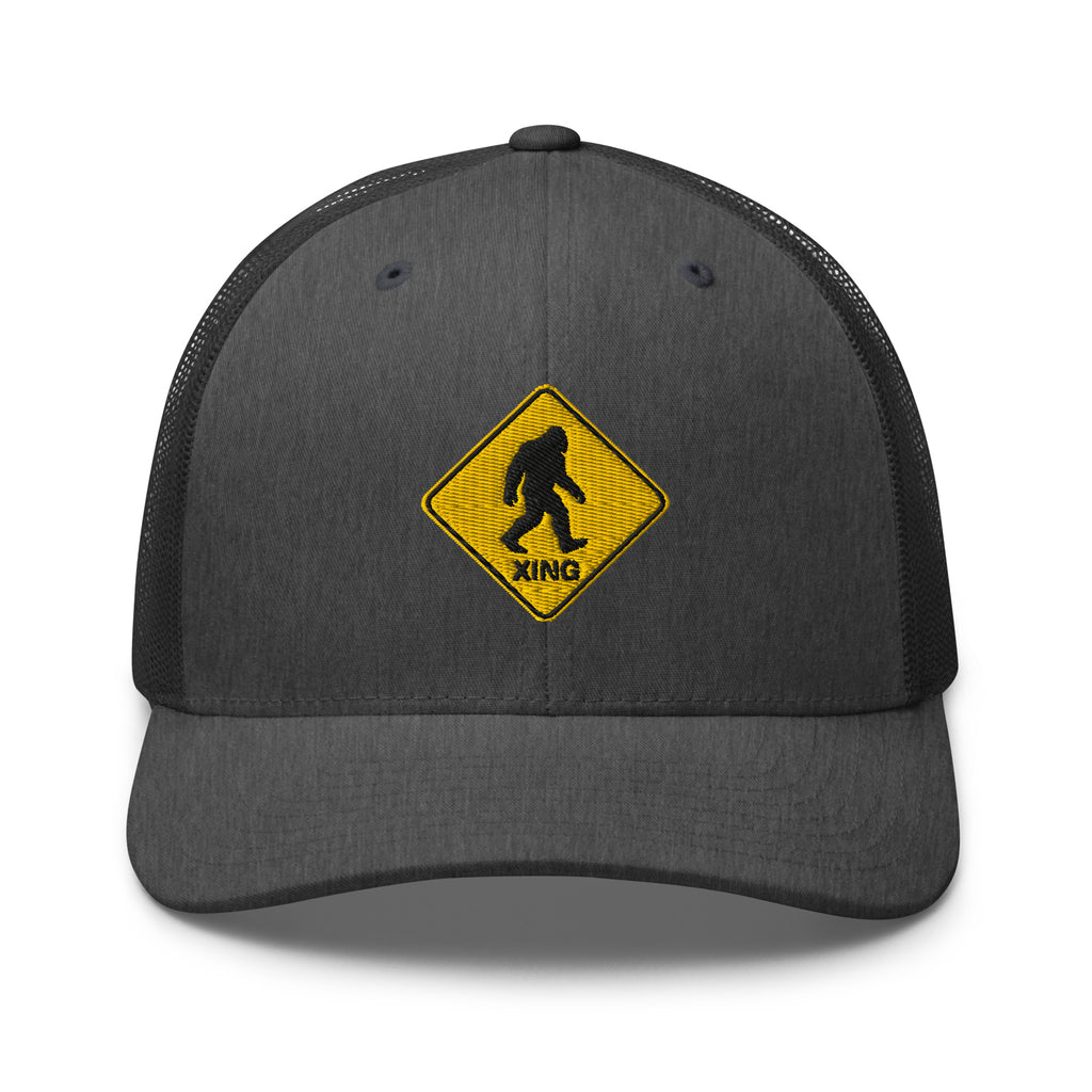 Bigfoot crossing sign embroidered dark gray heather trucker hat front view – funny outdoor gift cap