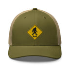 Bigfoot crossing sign embroidered moss trucker hat khaki mesh front view – funny outdoor camping cap