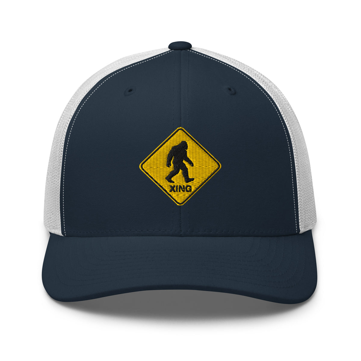Bigfoot crossing sign embroidered navy trucker hat white mesh front view – funny hiking outdoor cap