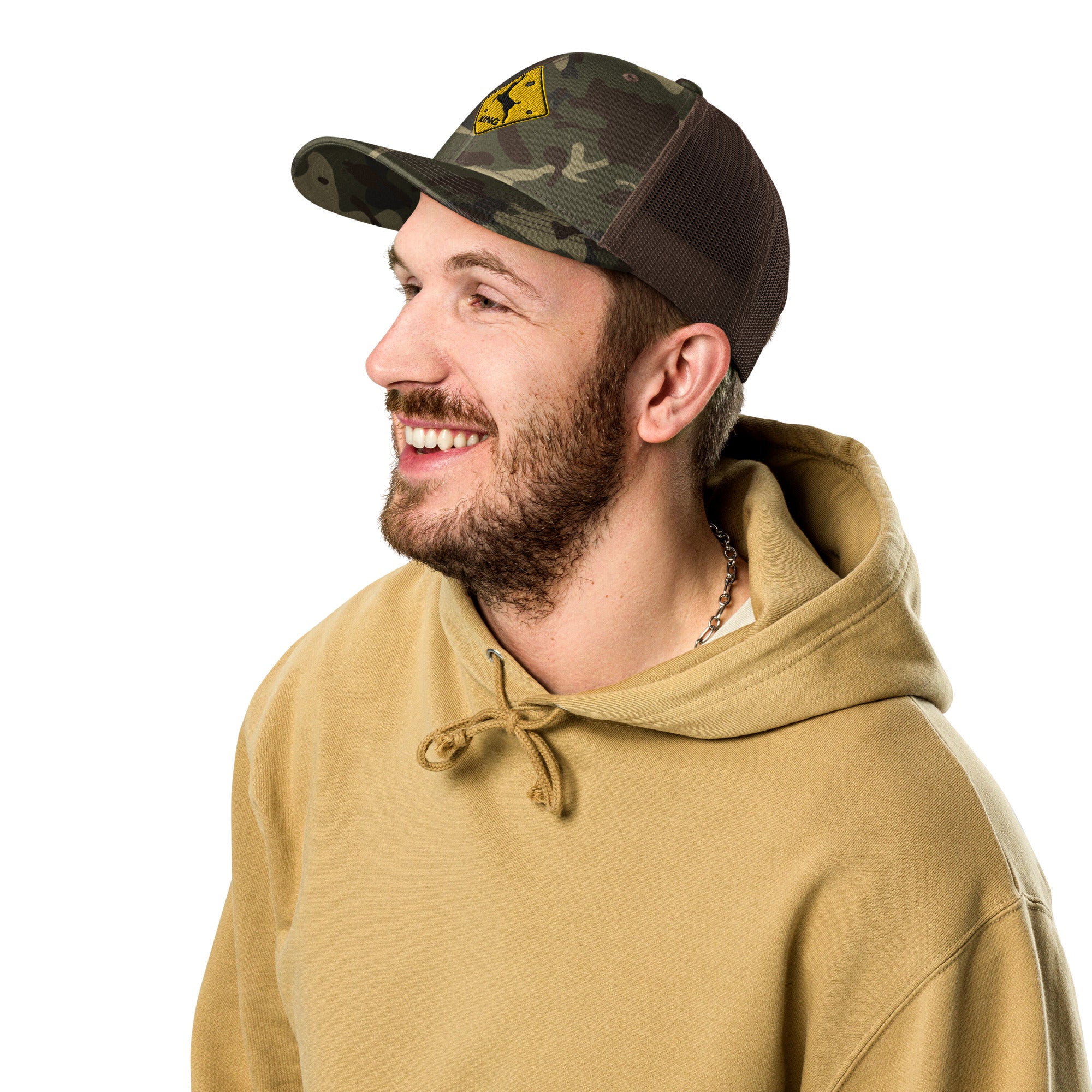Man wearing deer crossing sign camo trucker hat outdoors – funny deer hunting cap