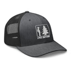 Dark gray heather I Pee Outside trucker hat side view – funny embroidered cap
