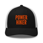 Power Hiker embroidered black trucker hat white mesh orange text front view – hiking cap